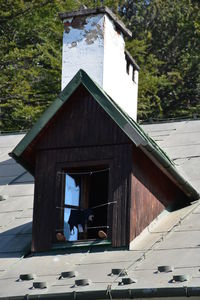 Man in front of built structure