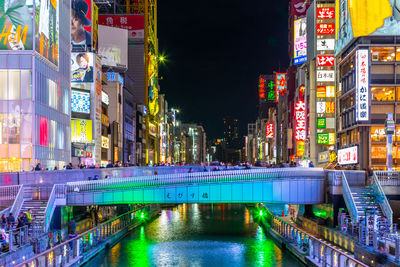 Osaka, japan tourist walking in night shopping street  dotonbori  osaka, namba, osaka, japan.