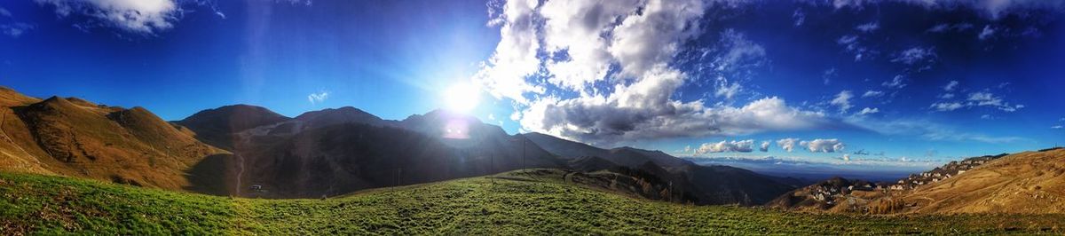 Panoramic view of mountains against sky