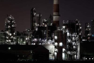 Illuminated buildings in city at night