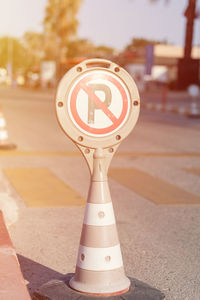 Close-up of stop sign on road