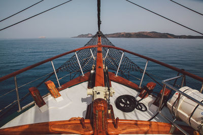 Cropped image of boats in sea