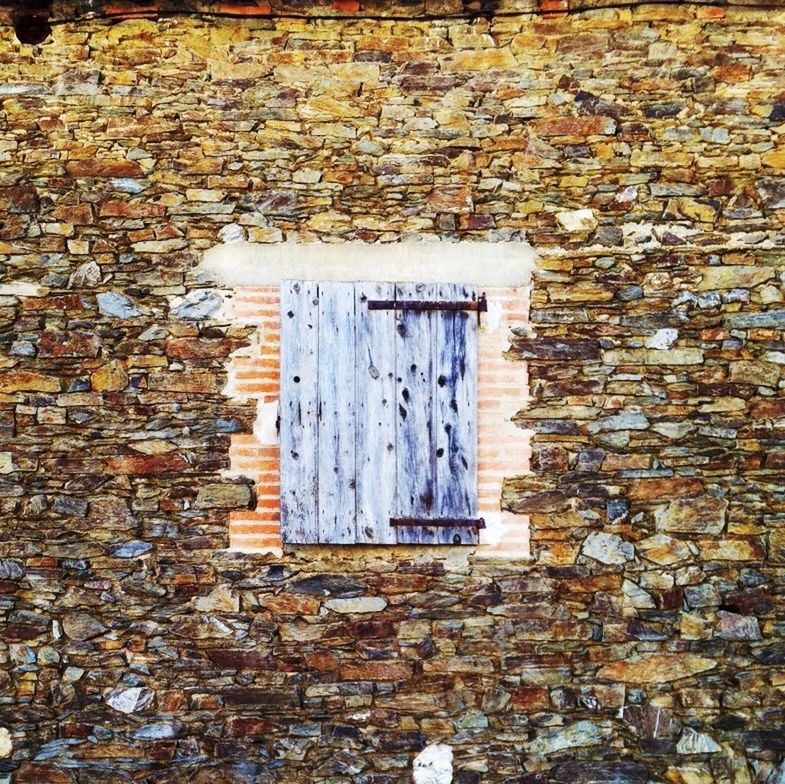 architecture, built structure, building exterior, window, wall - building feature, house, brick wall, wall, closed, door, blue, day, no people, outdoors, residential structure, shutter, weathered, textured, sunlight, residential building