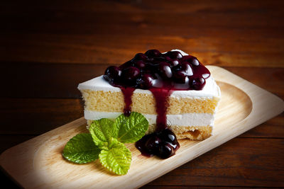 Close-up of cake served on table