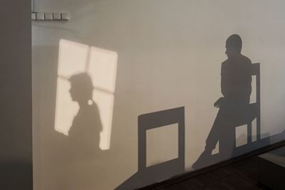 Shadow of man on wall