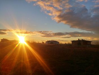 Sun shining through clouds