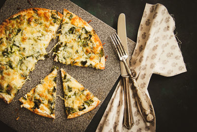 High angle view of pizza in plate on table