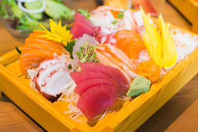 Close-up of food on table with japanese food menu