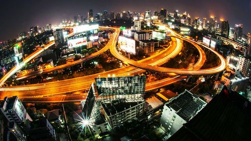 High angle view of light trails on city at night