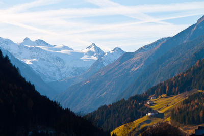 Scenic view of snowcapped mountains against sky