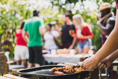 Group of people on barbecue grill