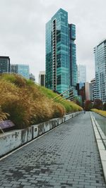 Buildings in city against sky