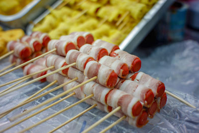 High angle view of meat on barbecue grill