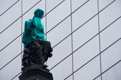 Low angle view of statue against sky