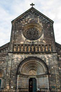 Low angle view of ornate building against sky