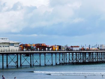 Pier over sea against sky