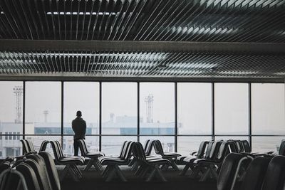 View of man sitting at airport