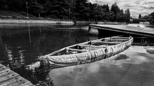 Boat moored in water