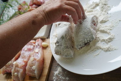 High angle view of person preparing food