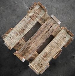 High angle view of wooden plank on table