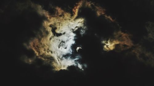 Low angle view of silhouette moon in sky