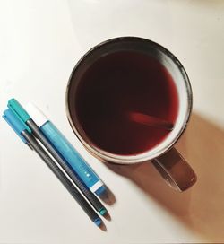 High angle view of coffee cup on table