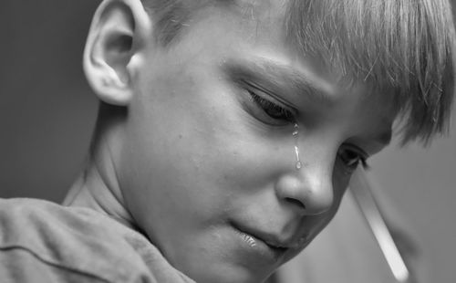 Close-up of boy crying