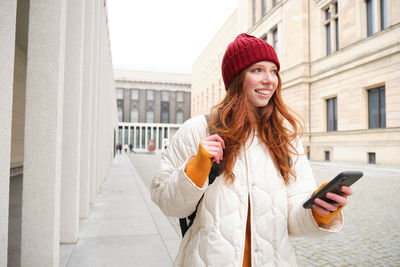 Young woman using mobile phone