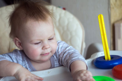 Portrait of cute baby at home