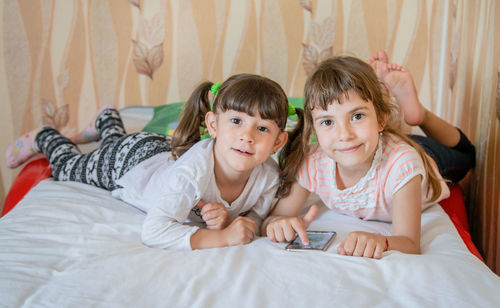 High angle view of mother and daughter at home