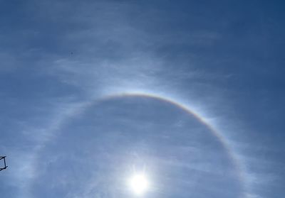 Low angle view of rainbow in sky