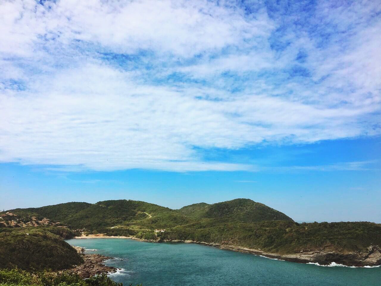 water, scenics, sea, tranquil scene, beauty in nature, nature, tranquility, sky, outdoors, no people, mountain, landscape, day, beach