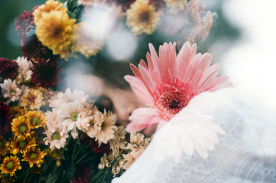 Double exposure of woman and flowers