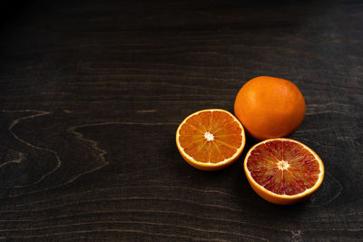 Close-up of orange fruit on table