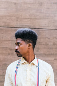 Portrait of young man looking away