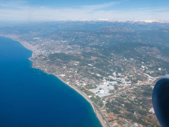 Turkish coastline of mediterranean sea near alanya. aerial view from plane illuminator.