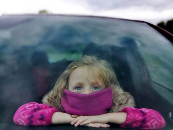 Portrait of girl in car