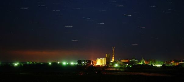 ILLUMINATED CITY AT NIGHT