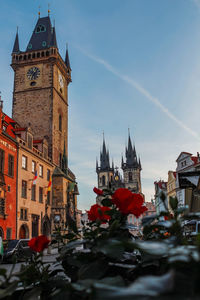 View of old town city hall, clock tower and church in old town square in prague