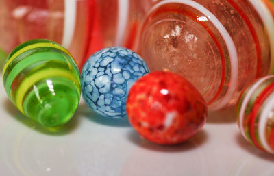 Close-up of multi colored candies on table