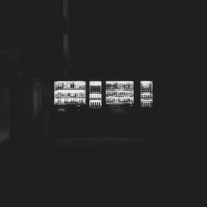 Illuminated text on building at night