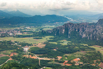 Aerial view of landscape and mountains against sky