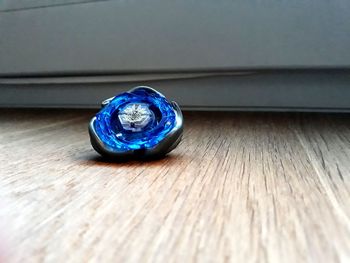 Close-up of blue wooden table