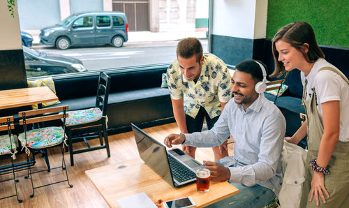 Business colleagues working at table