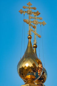 Domes with golden crosses on the pro-cathedral close-up