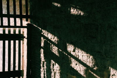 Shadow of person on stone wall