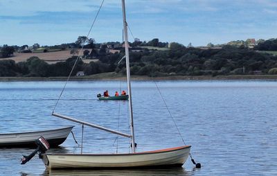 Sailboat sailing in sea