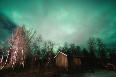 House on field against sky