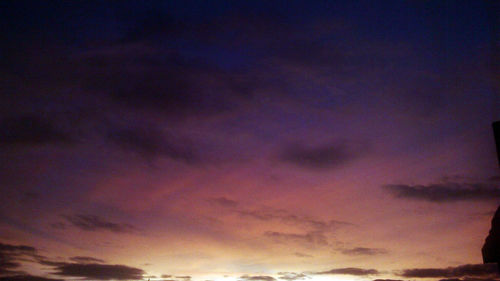 Low angle view of dramatic sky at dusk