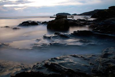 Scenic view of sea against sky during sunset